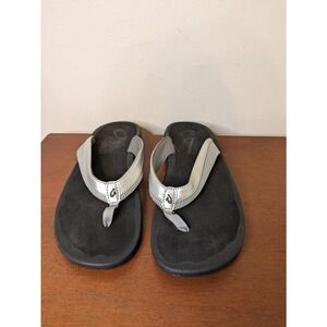 Okulai Women's Flip Flop Sandals Wehi 'Ohana-W Size 11 Black Silver.